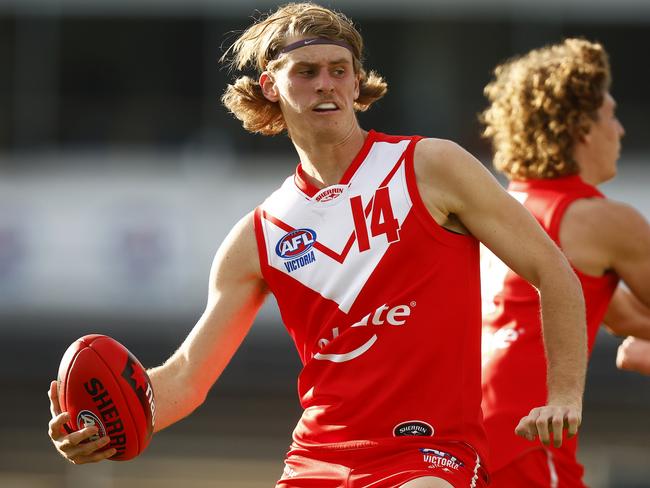 MELBOURNE, AUSTRALIA - MAY 15: Hugo Hall-Kahan of the Young Guns runs with the ball during the match between the Colgate Young Guns and Vic Country U18 at Ikon Park on May 15, 2022 in Melbourne, Australia. (Photo by Daniel Pockett/AFL Photos/via Getty Images )