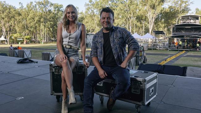 Australian country singer-songwriters Melanie Dyer (left) and Travis Collins (right) on site at CMC Rocks QLD music festival on Wednesday. Picture: Maclay Heriot