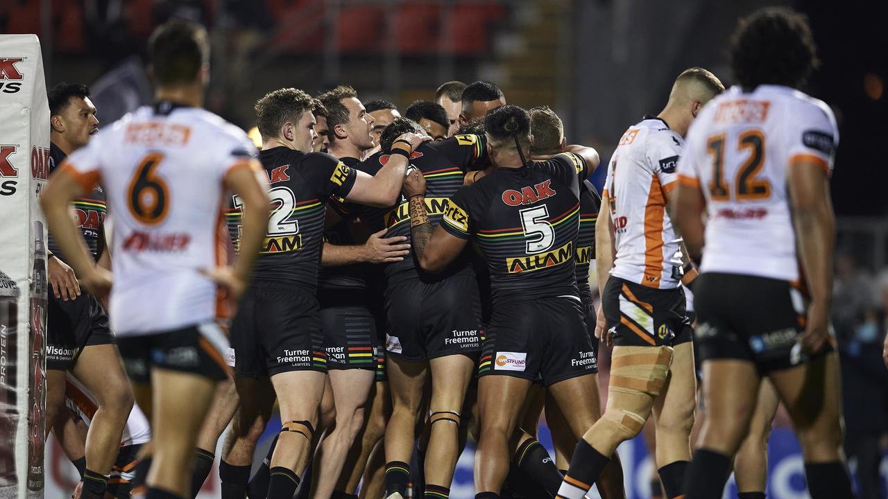 The Panthers celebrate a big win over the Tigers.