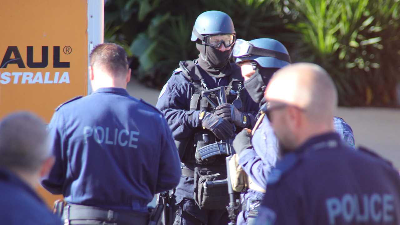 Heavily armed tactical police were involved in this morning's police operation at Sapphire Beach. Picture: Frank Redward