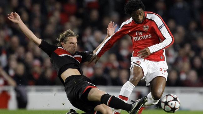 AZ Alkmaar's Brett Holman wins the ball from Arsenal’s Alex Song in the Champions League Group H match at the Emirates Stadium in London in November 2009.