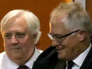 DAILY TELEGRAPH SPECIAL: Clive Palmer and Malcolm Turnbull leave the Wild Duck Chinese restaurant in Canberra as Treasury Secretary Martin Parkinson holds back in the shadows.(note: Photographs taken Wed.May 28th 2014)