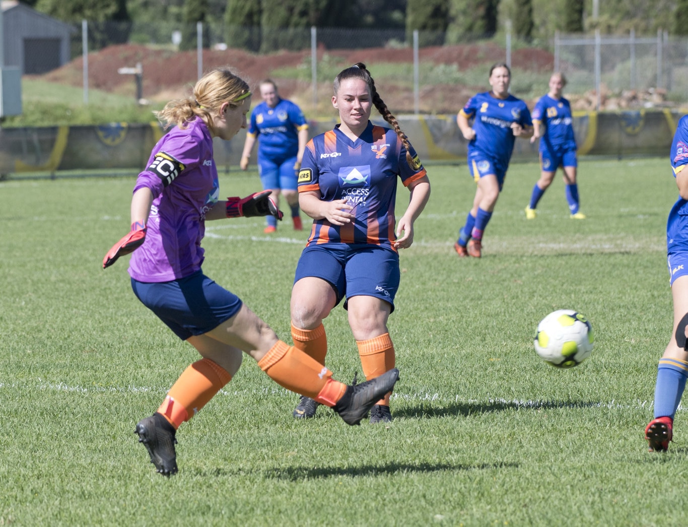 Melony Baker clears the ball for Hawks. USQFC vs Hawks Ladyhawks, 2020 TFL Premier Ladies. Sunday, 8th Mar, 2020.