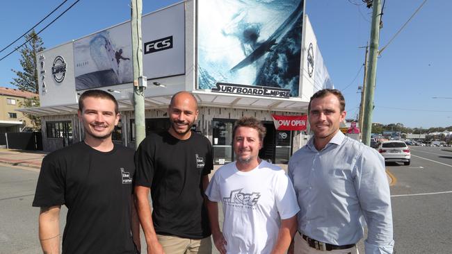 Bobby Douglas and Dominic Benjamin from I Like Ramen with Matt Cairns from Surfboard Empire and agent Cody Buck in front of the stores. Picture Glenn Hampson