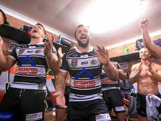 ROUSING RENDITION: Seagulls captain Cheyne Whitelaw belts out the team song alongside Sam Meskell after an incredible comeback vs Ipswich. Picture: SMP IMages