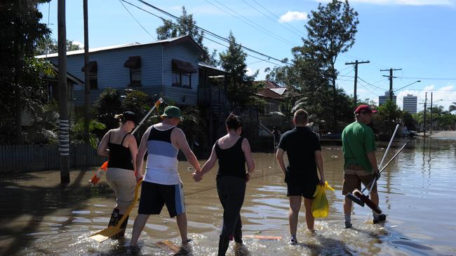 Devastated residents of Torwood Street in Milton returned to continue the clean up only to find their houses almost knee deep in water again due to the high tide. The return of the water hampered their efforts to get on with the clean up, bringing fresh misery for residents recovering from the devastating floods.