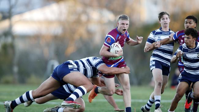 Wavell’s Corey Thomas takes the line on.