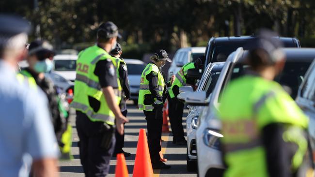 Police Covid ‘RBT’ on the Gold Coast Highway at Main Beach checking for essential travel. Picture: Nigel Hallett