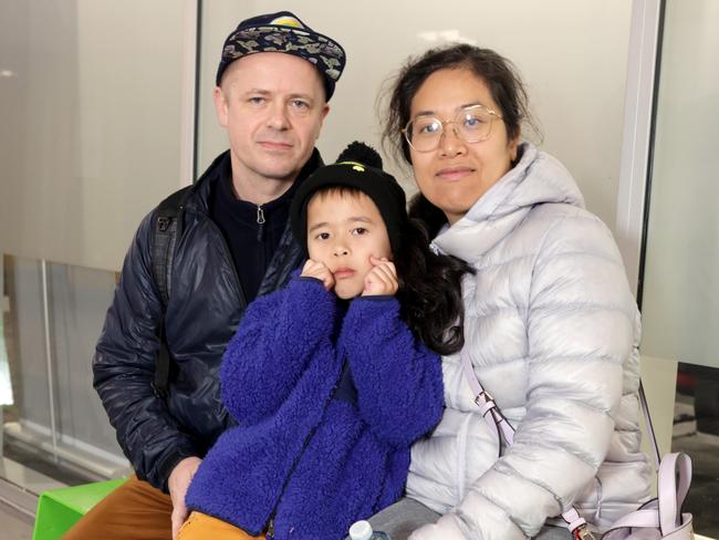 Sam Fitzgibbons and Jane Duong with son Noah Fitzgibbons, 7. Picture: Steve Pohlner