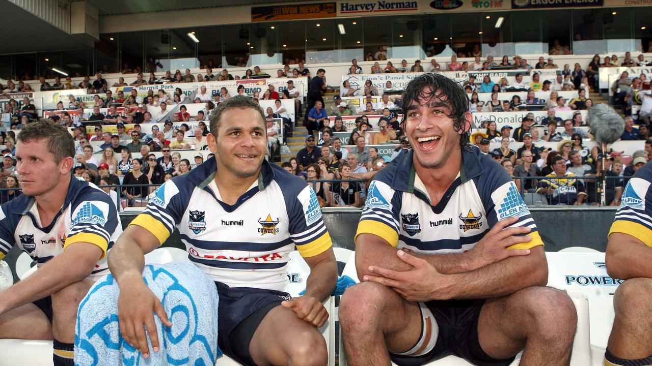 NRL - North Queensland Cowboys vs New Zealand Warriors @ Dairy Farmers stadium -Johnathan Thurston (R) takes a rest on the bench beside Matt Bowen (L) near the end of the game