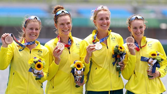 Bronze medallists Ria Thompson, Rowena Meredith, Harriet Hudson and Caitlin Cronin after the Quadruple Sculls Final in Tokyo.