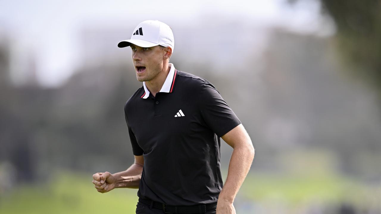 ‘Shut the f*** up’: Rory fumes at fan in fiery clash as Euro star storms home in epic $6.4m finish