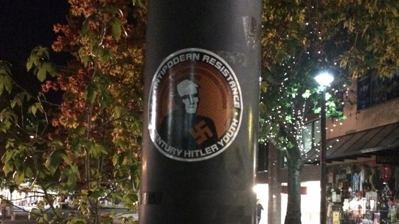 Stickers promoting the hate group have been posted all over Canberra.