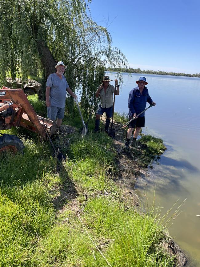 Shovels and and tractors were used to clean up the fish kill