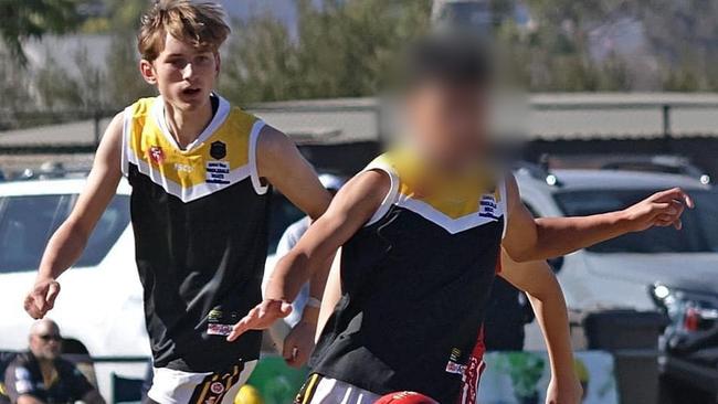 17-year old footballer Henry Nau (left) remains in hospital. Picture: MG Slattery Photography