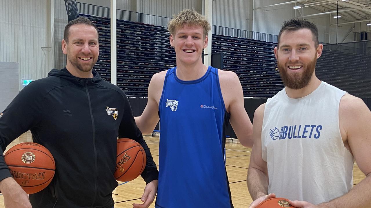 Rocco in his first Bullets session with assistant coach Greg Vanderjagt and Aron Baynes.