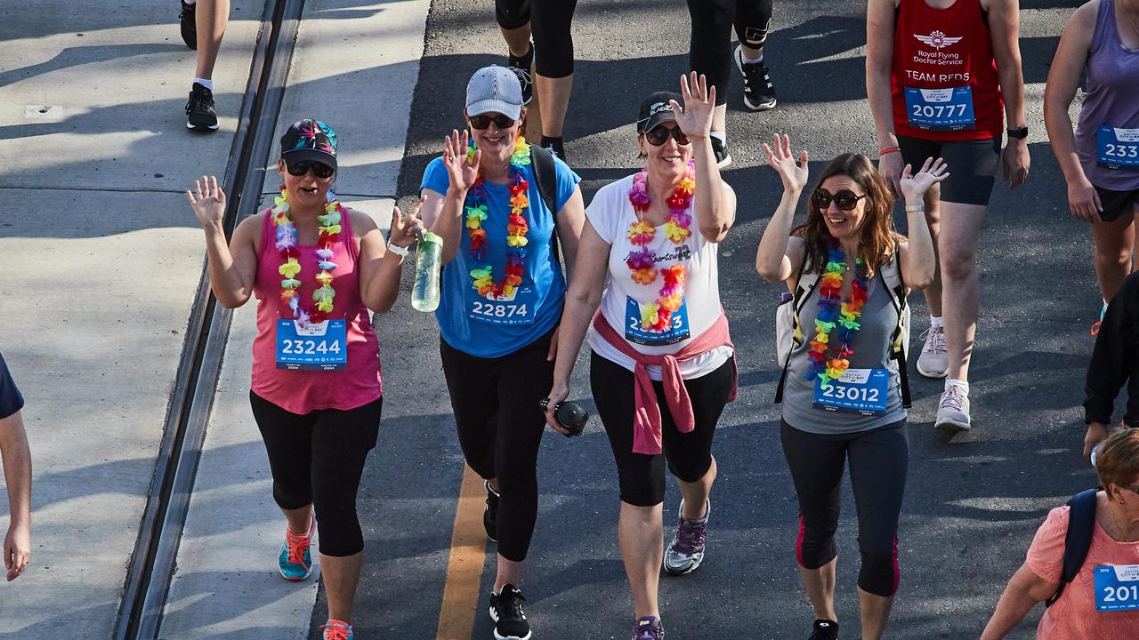 City to Bay participants walking in Adelaide, Sunday, Sept. 15, 2019. Picture: MATT LOXTON