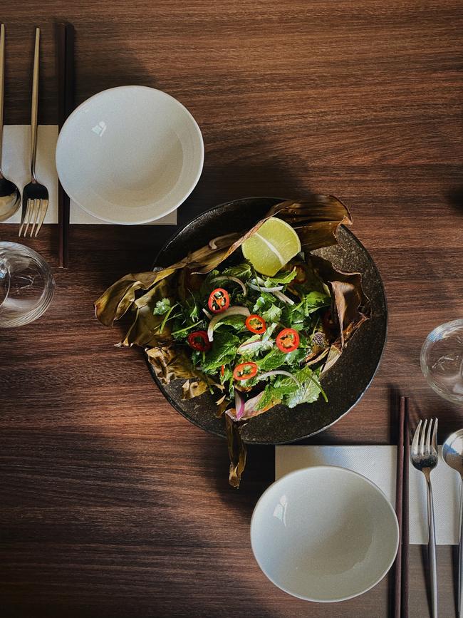 Turmeric and coconut roasted barramundi in banana leaf at Ông Vietnamese Kitchen, Adelaide. Picture: Supplied