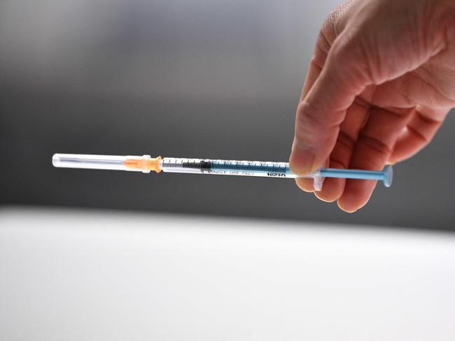 A syringe filled with the Pfizer-BioNTech Covid-19 vaccine is seen at the Chiba Rosai Hospital in Ichihara, Chiba perfecture on February 17, 2021, as the country launches its inoculation campaign against the virus. (Photo by Kazuhiro NOGI / AFP)