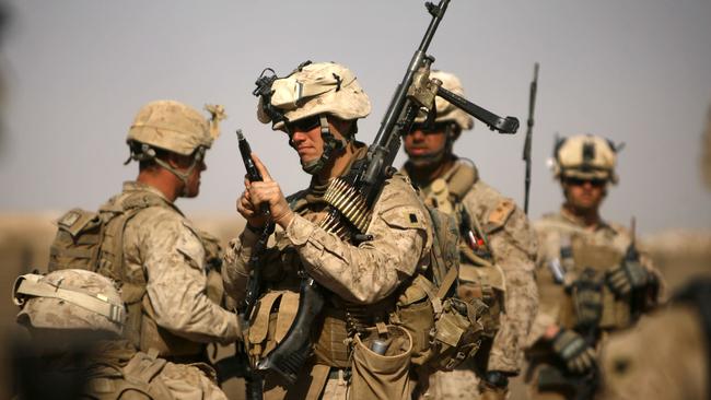 Obama admits Afghanistan troop surge was his hardest decision as ...