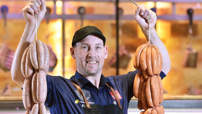 Tender Gourmet Butchery’s Paul Brady with some of their award-winning snags. Picture: Troy Snook