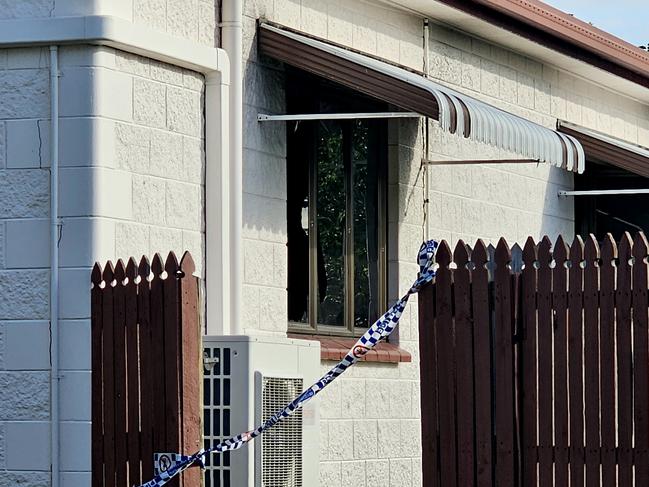 Police one scene at an alleged arson on Bailey St, Gulliver. Picture: Natasha Emeck