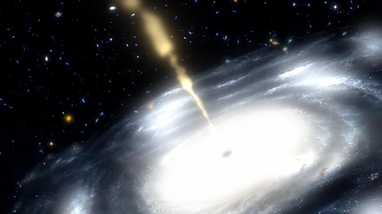 NASA artist's concept obtained June 2, 2010 shows a galaxy with a supermassive black hole at its core. The black hole is shooting out jets of radio waves. New research led by theoretical astrophysicist David Garofalo of NASA's Jet Propulsion Laboratory in Pasadena, Calif., suggests supermassive black holes that spin backwards might produce more ferocious jets of gas. The results have broad implications for how galaxies change over time. AFP PHOTO/NASA/JPL-CALTECH/HANDOUT