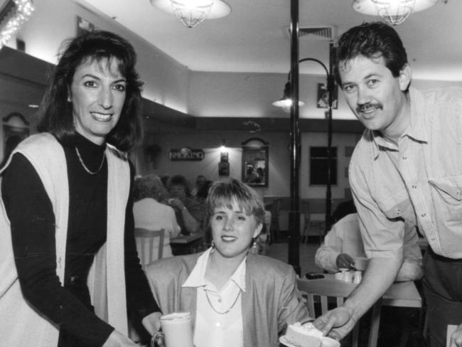 42nd Street Cafe, Tea Tree Plaza. Cafe proprietors Mary and Peter Rogers serving customer Sonja Hosking 21 Nov 1995. (Pic by staff photographer Neon Martin)