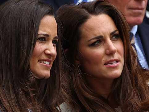 LONDON, ENGLAND - JULY 08: Pippa Middleton (L) and Catherine, Duchess of Cambridge sit in the Royal Box during the Gentlemen's Singles final match between Roger Federer of Switzerland and Andy Murray of Great Britain on day thirteen of the Wimbledon Lawn Tennis Championships at the All England Lawn Tennis and Croquet Club on July 8, 2012 in London, England. (Photo by Clive Brunskill/Getty Images)