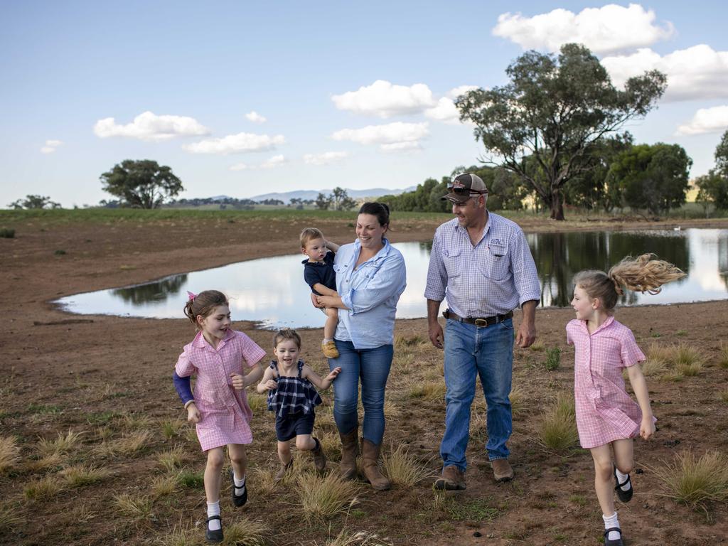 Nick Bailey and his family on their property 'Big Panuara', 40kms south west of Orange. Children are (oldest to youngest) Harriet, Polly, Abbey and Sandy (baby boy).Picture: Kirsten Cunningham / The Australian