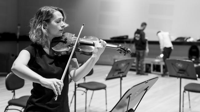 Tasmanian Symphony Orchestra Concertmaster Emma McGrath says Eivind Aadland has “a natural and warm rapport” with musicians. Picture: Dan Cripps.