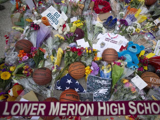 Flowers and other items are left at a memorial for Kobe Bryant at Lower Merion High School in Ardmore, Pennsylvania. Picture: Getty