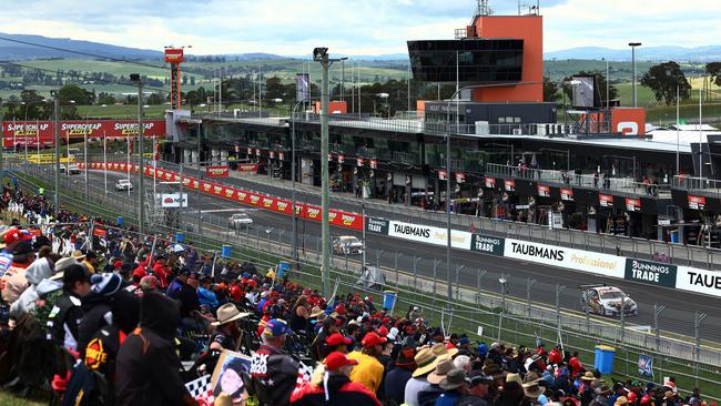 Thousands of spectators flooded Bathurst for the annual four-day car race at Mount Panorama last weekend, sparking fears of a widespread outbreak. Photo: Daniel Kalisz/Getty Images