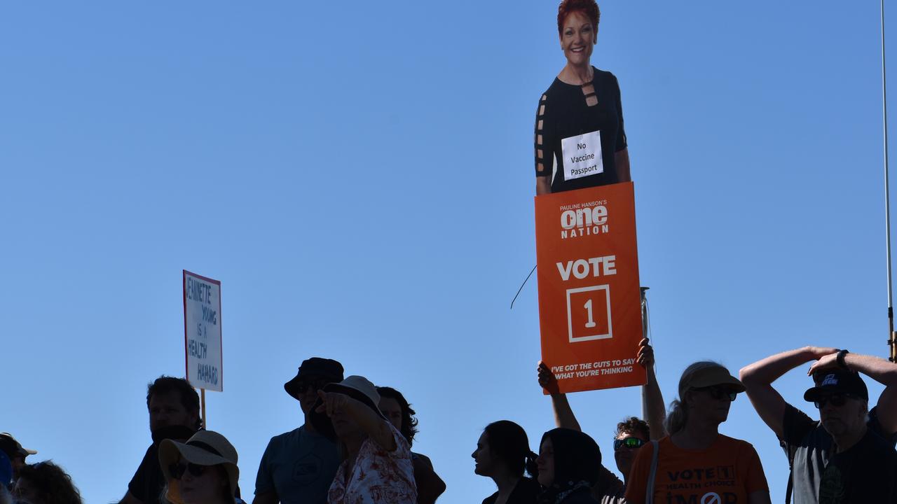 A protester with a Pauline Hanson sign. Photo: Liana Walker