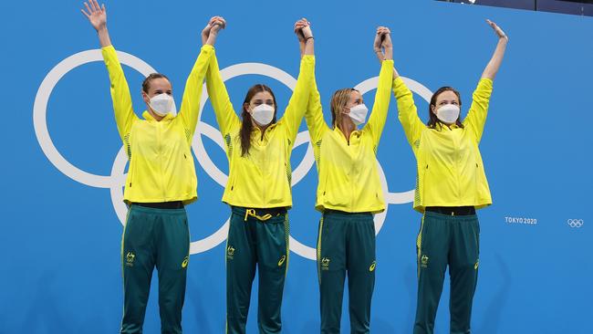 Bronte Campbell, Meg Harris, Emma McKeon and Cate Campbell of Team Australia pose after winning the gold medal in the Women's 4 x 100m Freestyle Relay Final on day two of the Tokyo 2020 Olympic Games at Tokyo Aquatics Centre on July 25, 2021 in Tokyo, Japan. (Photo by Clive Rose/Getty Images)