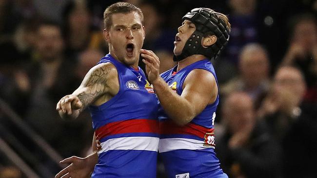 AFL. Western Bulldogs vs. Richmond at Etihad Stadium.   Western Bulldogs Clay Smith celebrates putting the Dogs back in front late in the game    . Pic: Michael Klein