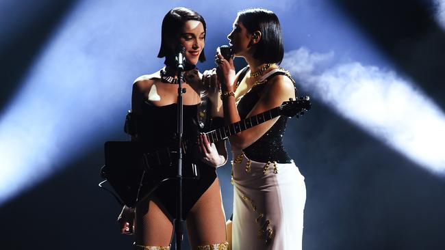 St. Vincent, left, and Dua Lipa perform onstage. Dua Lipa won Best New Artist. Picture: Kevin Winter/Getty Images