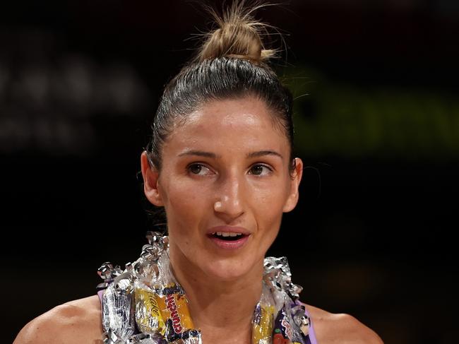 ADELAIDE, AUSTRALIA - APRIL 13: Kim Ravaillion celebrates her 150th SSN match of the Queensland Firebirds during the round one Super Netball match between Adelaide Thunderbirds and Queensland Firebirds at Adelaide Entertainment Centre, on April 13, 2024, in Adelaide, Australia. (Photo by Maya Thompson/Getty Images)