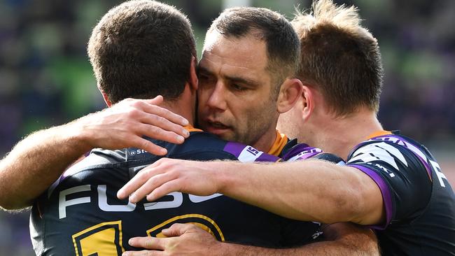 Kenny Bromwich celebrates a try with Cameron Smith. Picture: AAP