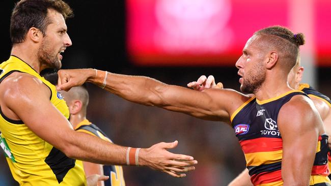 Cam Ellis-Yolmen  goes toe to toe with Richmond ruckman Toby Nankervis. Picture: AAP Image/David Mariuz