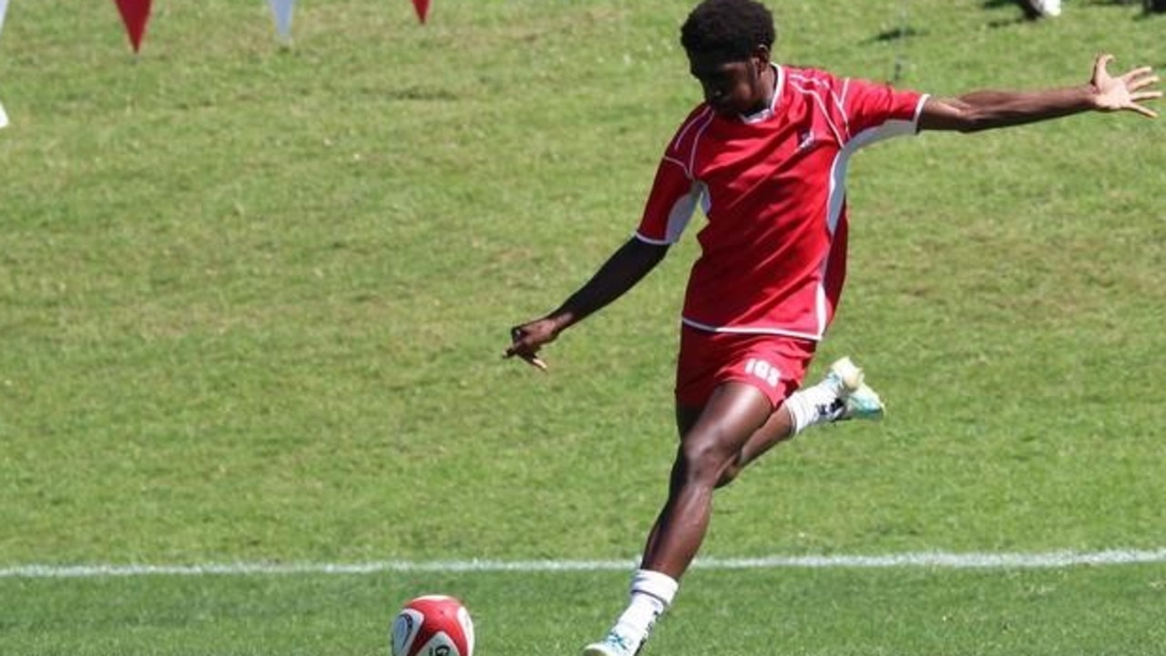 Souths Logan's Derek Ahwang, of Ipswich Grammar School, kicking for goal.