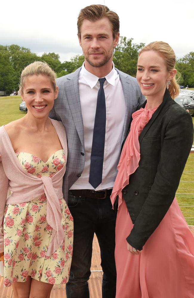 Say cheese ... Elsa Pataky, Chris Hemsworth and Emily Blunt attend the Audi Polo Challenge at Coworth Park, Ascot. Picture: Getty