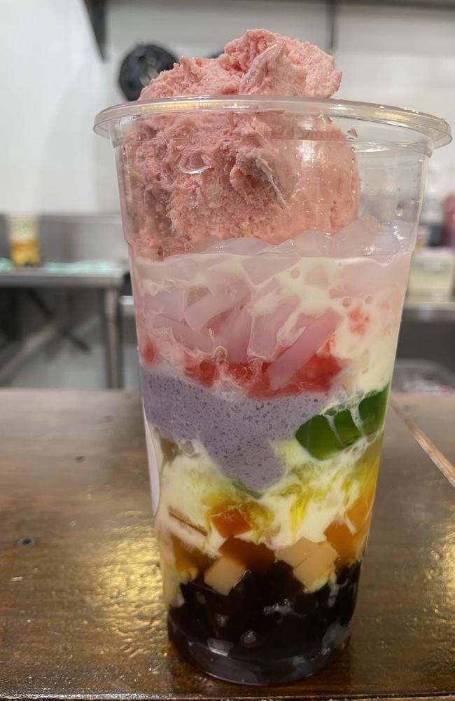 A hola hola - made from popping pearls, egg pudding, rainbow jelly, crushed ice, evaporated milk, taro pudding, palm seeds, jack fruit, grass jelly, strawberry syrup, coconut jelly and your choice of ice cream topping. A big stomach is needed to tackle the $15 dessert.