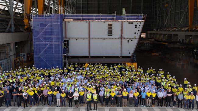 Premier Peter Malinauskas with BAE Systems Australia’s managing director maritime Craig Lockhart and staff at the Osborne Naval Shipyard. Photo: Naomi Jellicoe