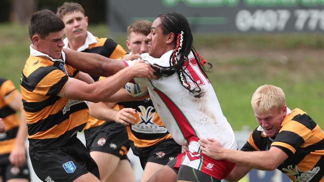 JJ Mau Pohiva charging into the Tigers’ defence. Picture: Sue Graham