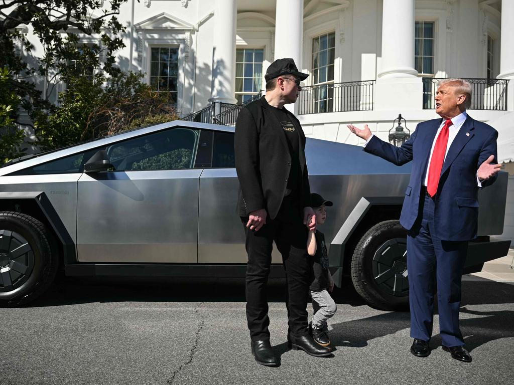 US President Donald Trump and Tesla CEO Elon Musk speak to the press as they stand next to a Tesla Cybertruck. Picture: Mandel Ngan/AFP