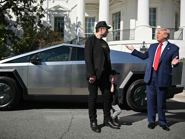 US President Donald Trump and Tesla CEO Elon Musk speak to the press as they stand next to a Tesla Cybertruck. Picture: Mandel Ngan/AFP