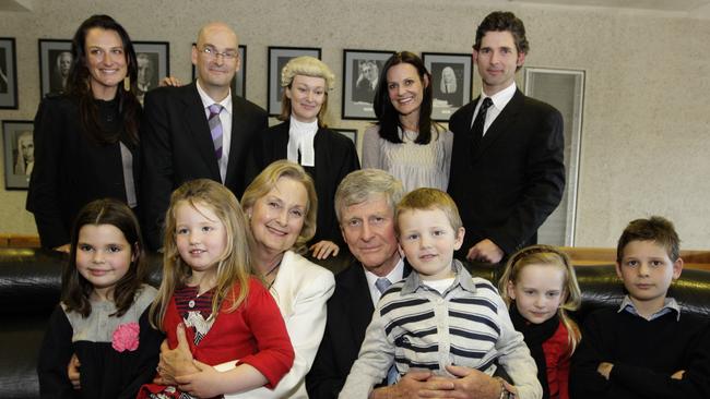 A ceremony to mark the retirement of the Chief Justice of Australia, Murray Gleeson held at the High Court of Australia in Canberra. (L-R) front row - Sophia Bana, Jasmine Taylor, Robyn Gleeson, Chief Justice Murray Gleeson, Xavier Taylor, Clare Taylor and Klaus Bana. back row - Gabrielle Gleeson, Nicholas Gleeson, Jacqueline Gleeson, Rebecca and Eric.