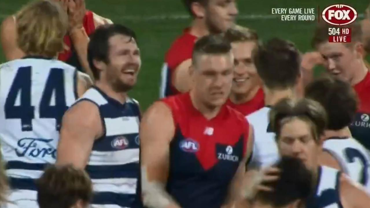 Bernie Vince and Patrick Dangerfield share a laugh after Melbourne's loss to Geelong.