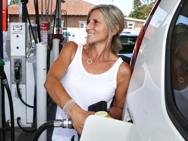 Annettre Foia filling up at Rebel Petrol, Earlwood. Cheap petrol, 99.5 cents / litre. (Annette mobile 0405383400.)